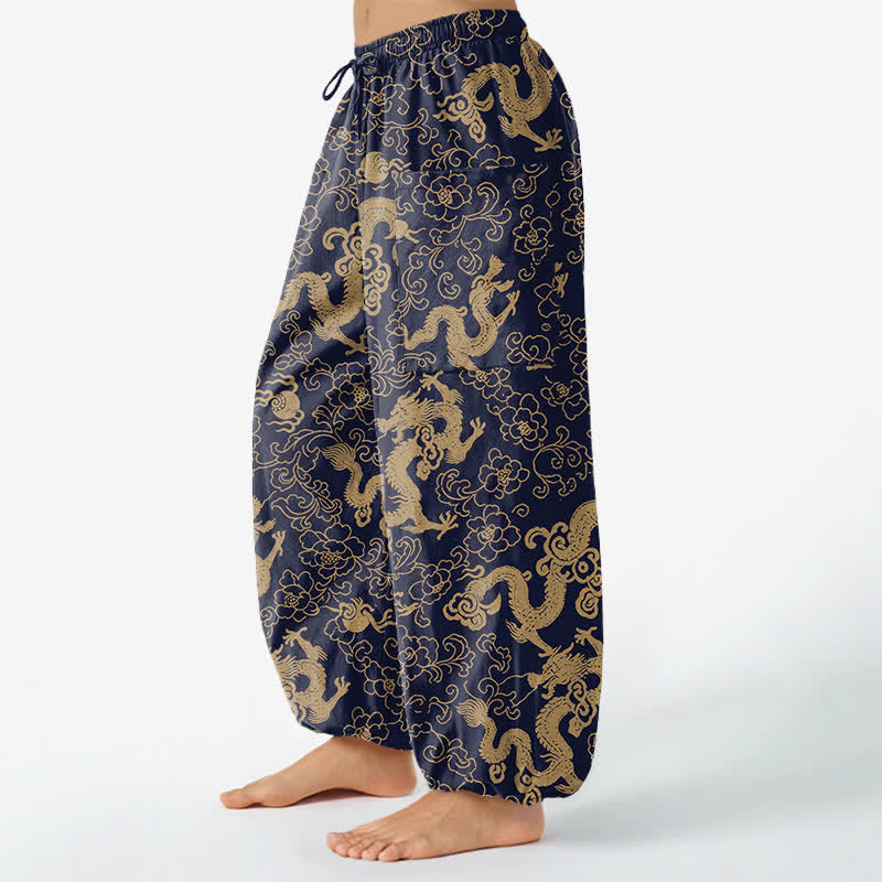 Buddha Stones Pantaloni harem da donna in cotone con elastico in vita e motivo floreale a drago dorato, con tasche laterali. - image 1
