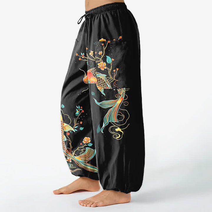 Buddha Stones Pantaloni harem da donna in cotone con motivo floreale orientale e carpe koi, vita elasticizzata e tasche laterali. - image 1