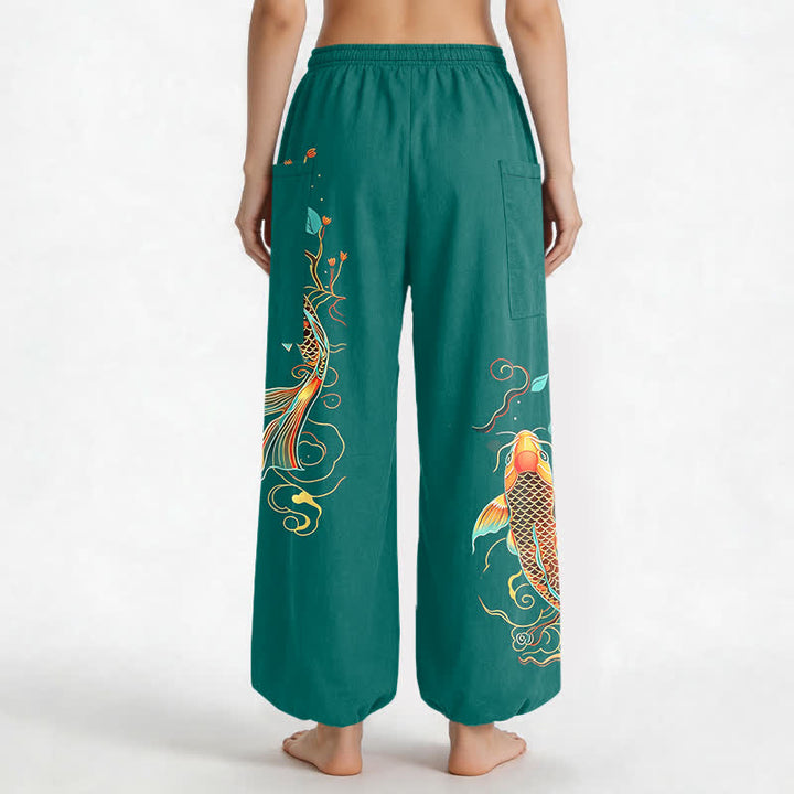Buddha Stones Pantaloni harem da donna in cotone con motivo floreale orientale e carpe koi, vita elasticizzata e tasche laterali. - image 9