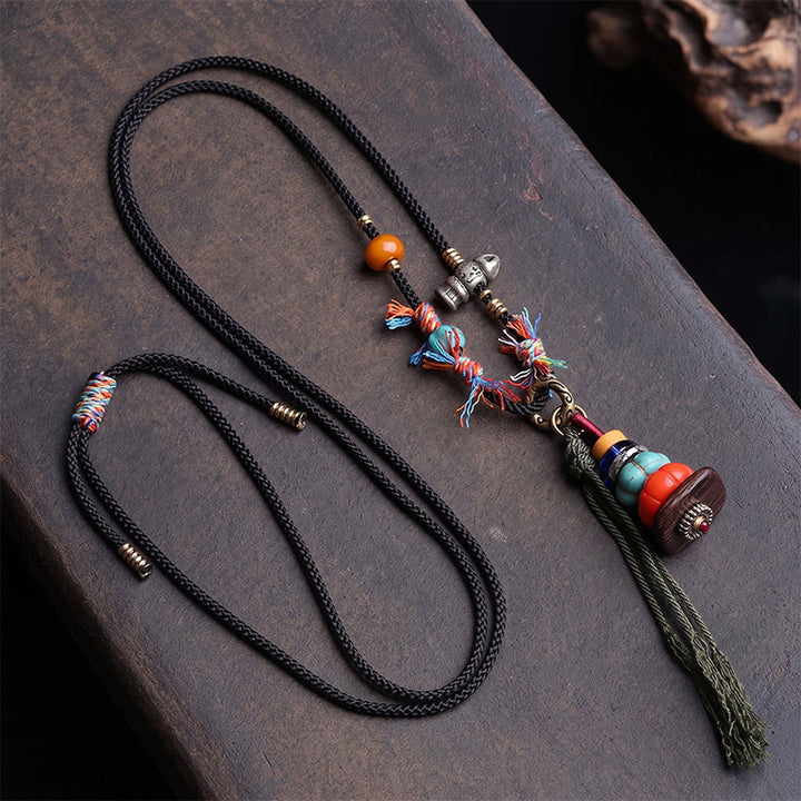 Buddha Stones Collana con nappa e design a cumulo di pietre Mani tibetane LiuLi, con pietre di radicamento. - image 1