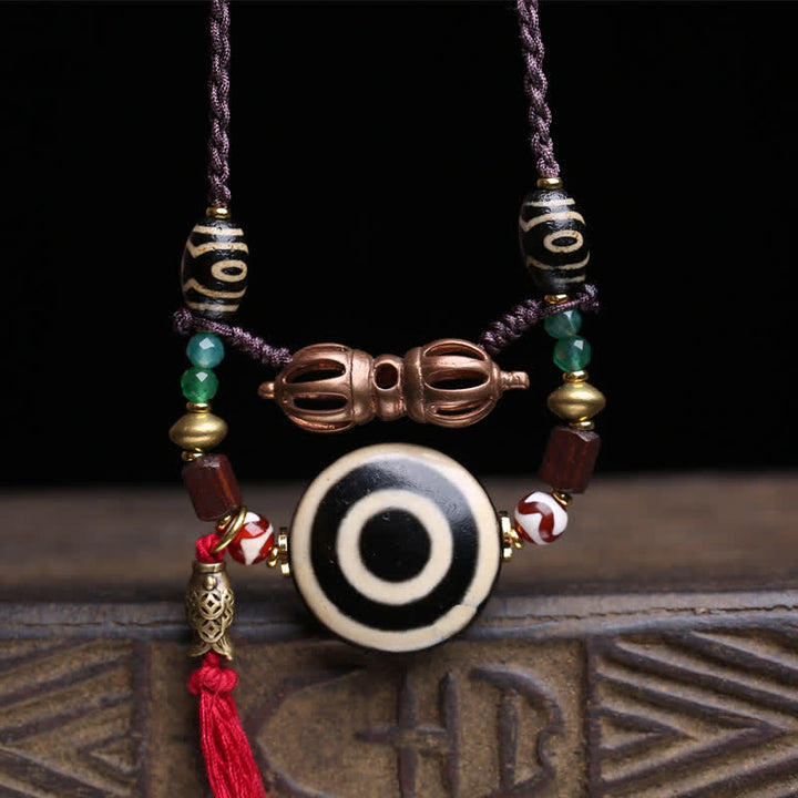 Buddha Stones Collana protettiva con perline Dzi tibetane Vajra a tre occhi e corda intrecciata - image 1