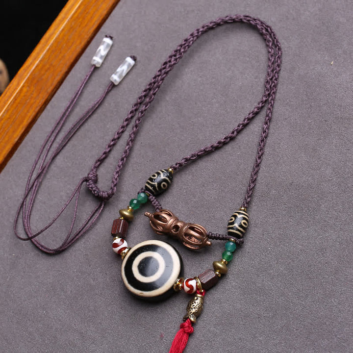 Buddha Stones Collana protettiva con perline Dzi tibetane Vajra a tre occhi e corda intrecciata - Circa 24 × 10 mm - image 0