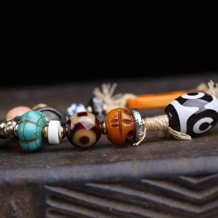 Buddha Stones Collana tibetana con perline Dzi a tre occhi e simbolo di Vajra, portafortuna. - image 5