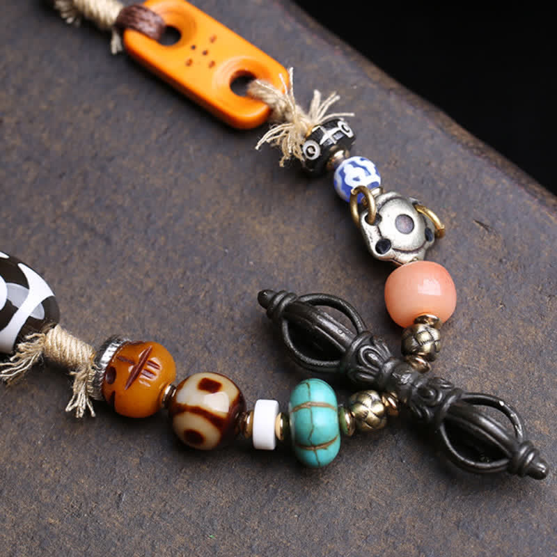 Buddha Stones Collana tibetana con perline Dzi a tre occhi e simbolo di Vajra, portafortuna. - image 3