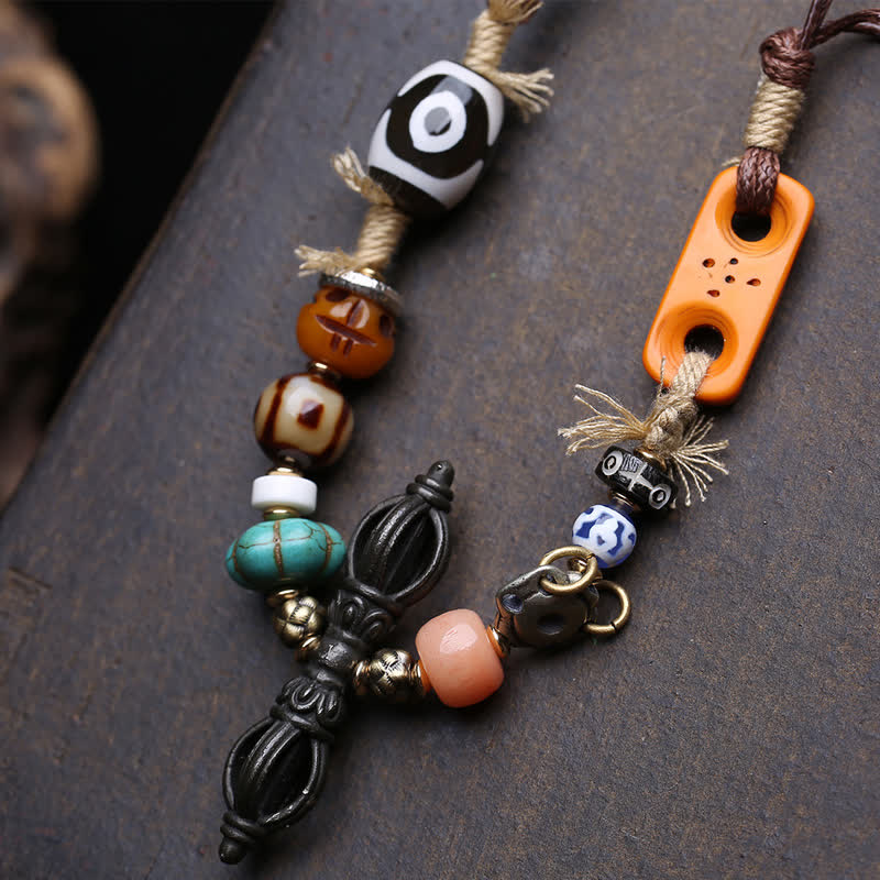 Buddha Stones Collana tibetana con perline Dzi a tre occhi e simbolo di Vajra, portafortuna. - image 4