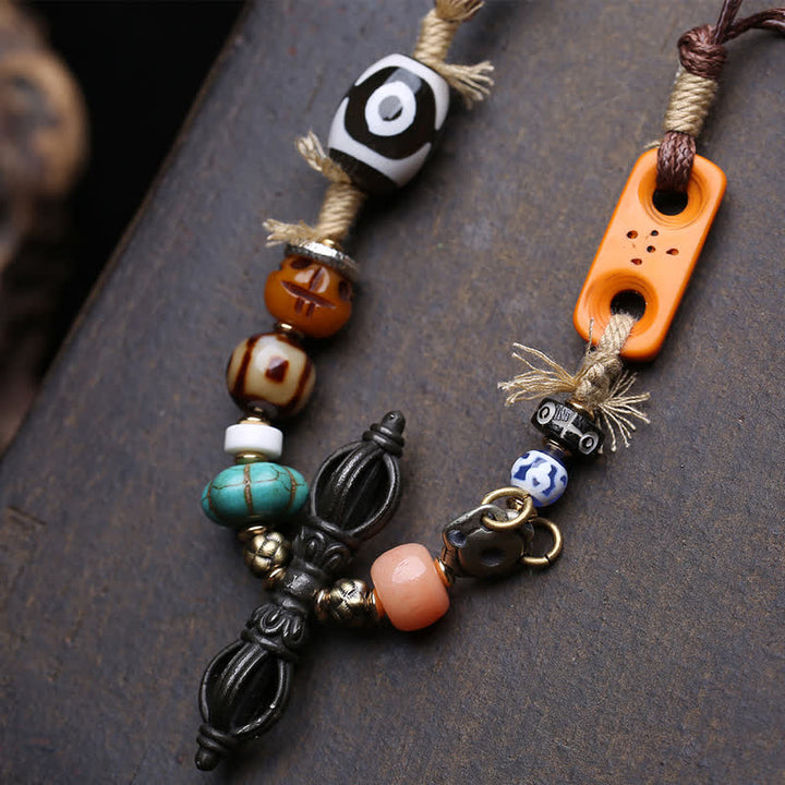 Buddha Stones Collana tibetana con perline Dzi a tre occhi e simbolo di Vajra, portafortuna. - image 4