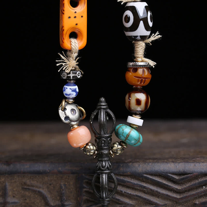 Buddha Stones Collana tibetana con perline Dzi a tre occhi e simbolo di Vajra, portafortuna. - image 2