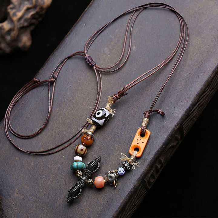 Buddha Stones Collana tibetana con perline Dzi a tre occhi e simbolo di Vajra, portafortuna. - Circa 46 × 10 mm - image 0