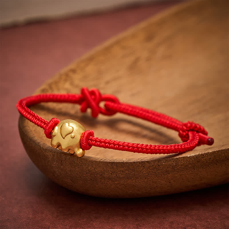 Buddha Stones Bracciale di protezione in rame con elefante e cordino rosso - image 1