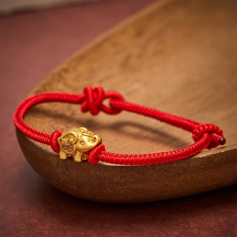 Buddha Stones Braccialetto di forza con filo rosso elefante e rame - image 1