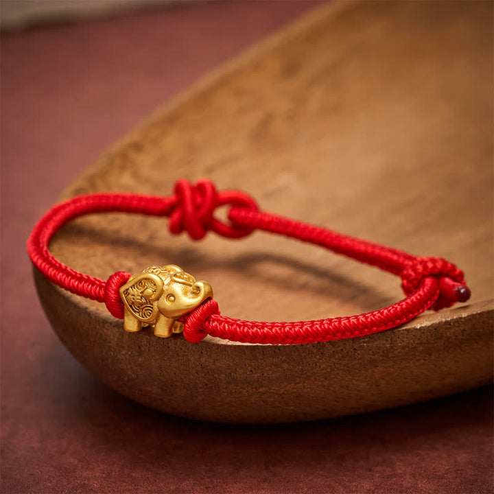Buddha Stones Braccialetto di forza con filo rosso elefante e rame - image 1