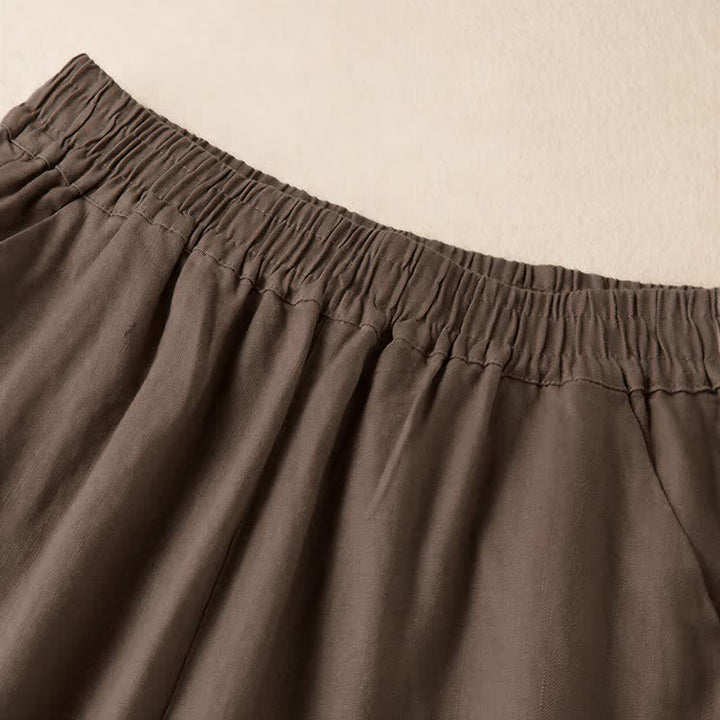 Pantaloni da donna a gamba larga, tinta unita, con tasche e stampa Buddha Stones. - image 15
