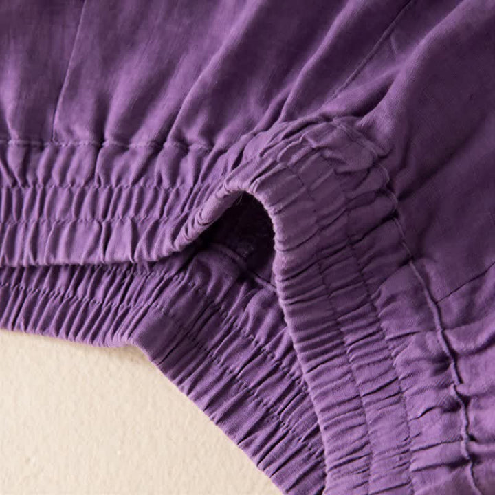 Pantaloni da donna a gamba larga, tinta unita, con tasche e stampa Buddha Stones. - image 10