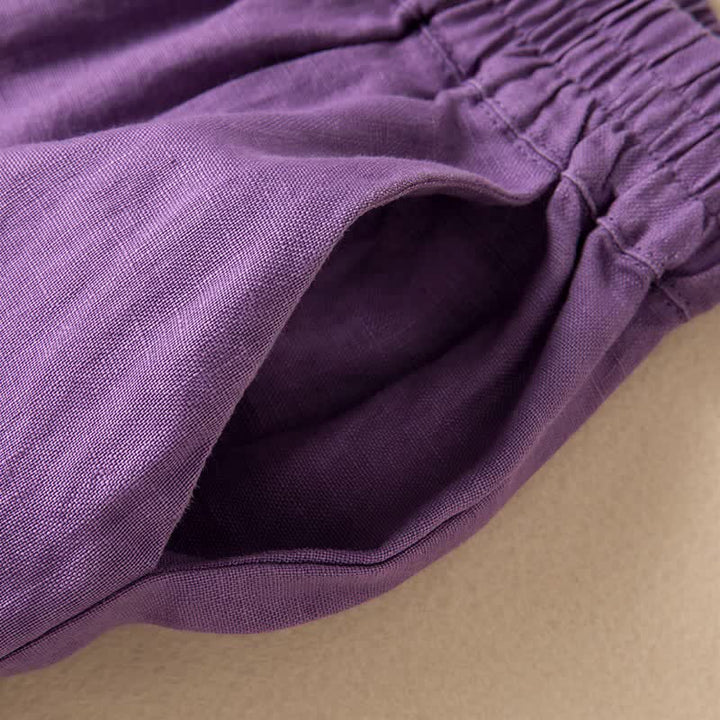 Pantaloni da donna a gamba larga, tinta unita, con tasche e stampa Buddha Stones. - image 11
