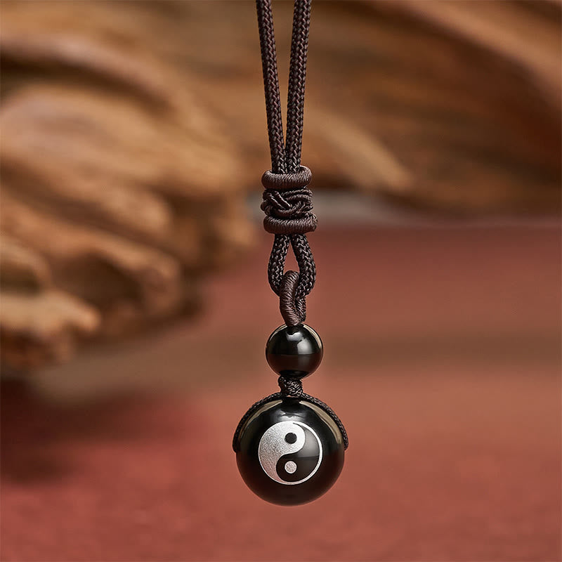 Buddha Stones Collana con ciondolo Yin Yang di purificazione intagliato in ossidiana nera, simbolo di ossidiana nera. - Motivo Yin Yang con lamina d'argento - 26,8 pollici / 68 cm - image 0