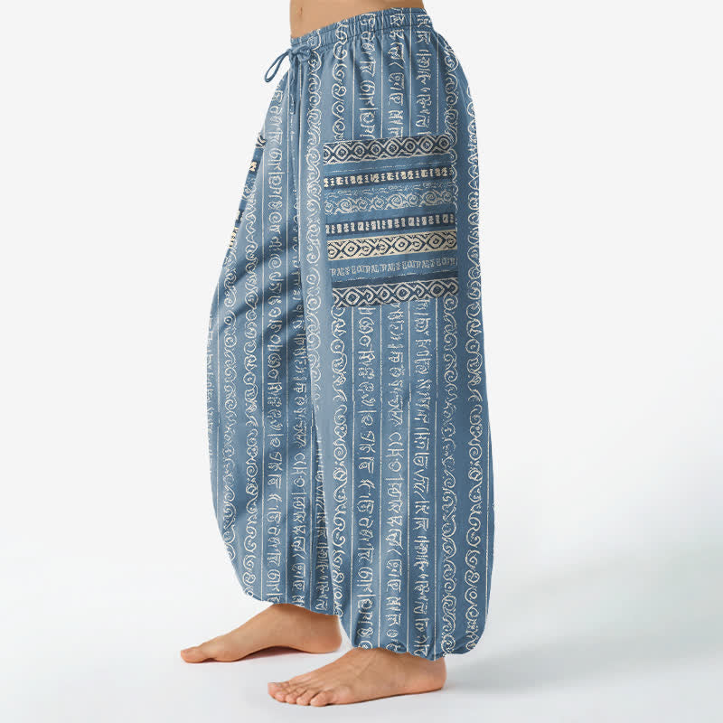 Buddha Stones Pantaloni harem da donna in cotone con elastico in vita e tasche laterali, fantasia a righe geometriche etniche. - image 1