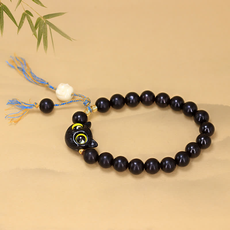 Buddha Stones Bracciale rotondo intrecciato con ciondolo a forma di gatto in legno d'ebano. - image 3