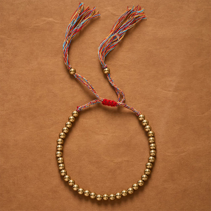 Buddha Stones Bracciale con perline di rame e filo rosso - image 2