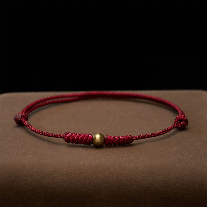 Buddha Stones Braccialetto con perline di rame e cordino rosso - image 3