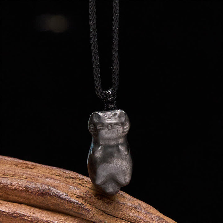 Buddha Stones Collana con ciondolo a forma di gatto in ossidiana con riflessi argentati e cordino intrecciato per un radicamento a terra. - Ossidiana argentata (Radicamento ♥ Intuizione) - image 0