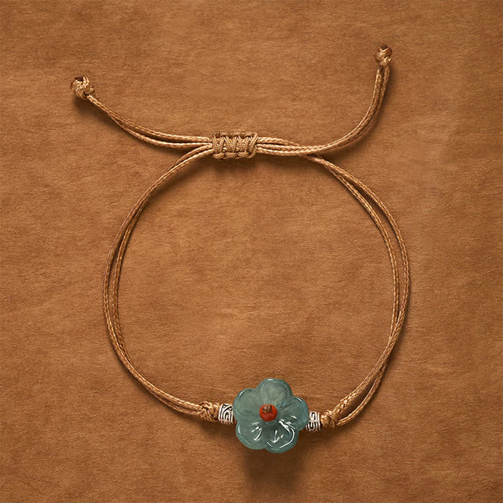 Buddha Stones Bracciale in giada naturale intrecciato a mano con motivo floreale. - image 1