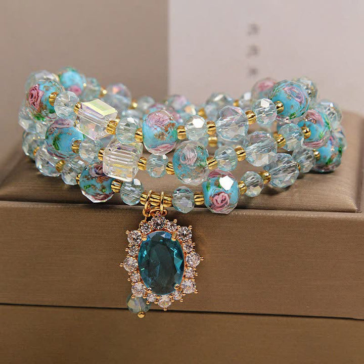 Buddha Stones Bracciale a triplo giro con ciondolo ovale floreale e perline di vetro Blue Liuli. - image 9
