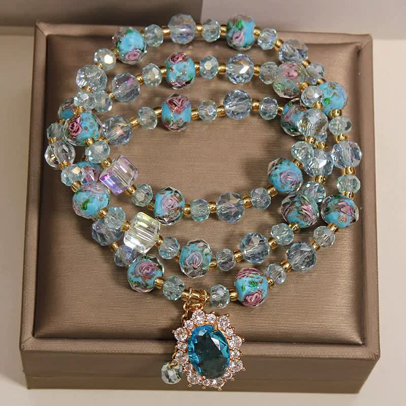 Buddha Stones Bracciale a triplo giro con ciondolo ovale floreale e perline di vetro Blue Liuli. - image 1