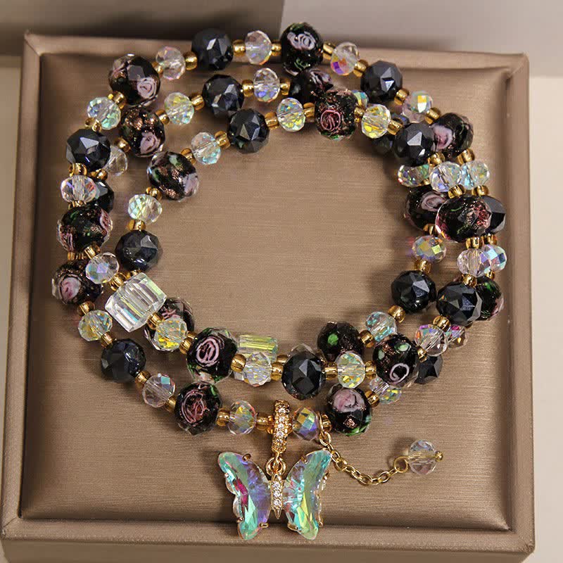 Buddha Stones Bracciale a triplo giro con perline di vetro Black Liuli, ciondolo a forma di rosa e farfalla. - image 1