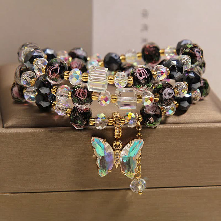 Buddha Stones Bracciale a triplo giro con perline di vetro Black Liuli, ciondolo a forma di rosa e farfalla. - Farfalla (Trasformazione ♥ Amore) - image 0