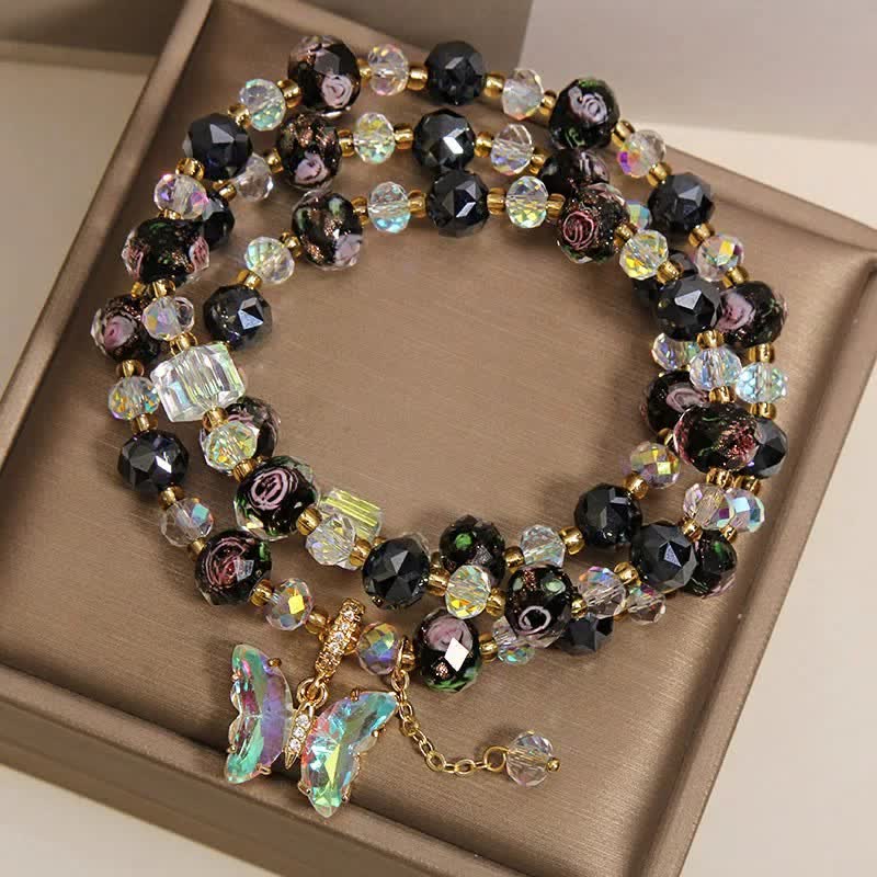 Buddha Stones Bracciale a triplo giro con perline di vetro Black Liuli, ciondolo a forma di rosa e farfalla. - image 3