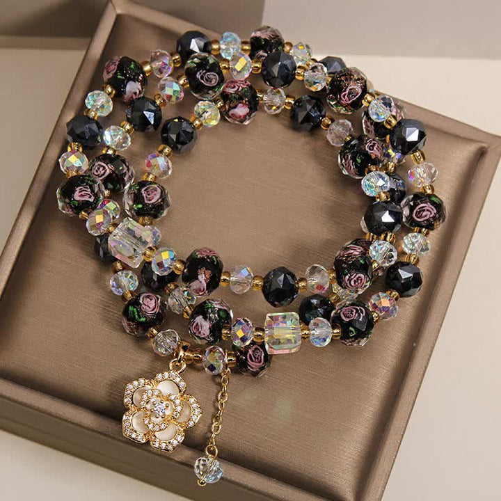 Buddha Stones Bracciale con ciondolo a forma di fiore di camelia e perline di vetro nere Liu Li, con connessione armonica. - image 3