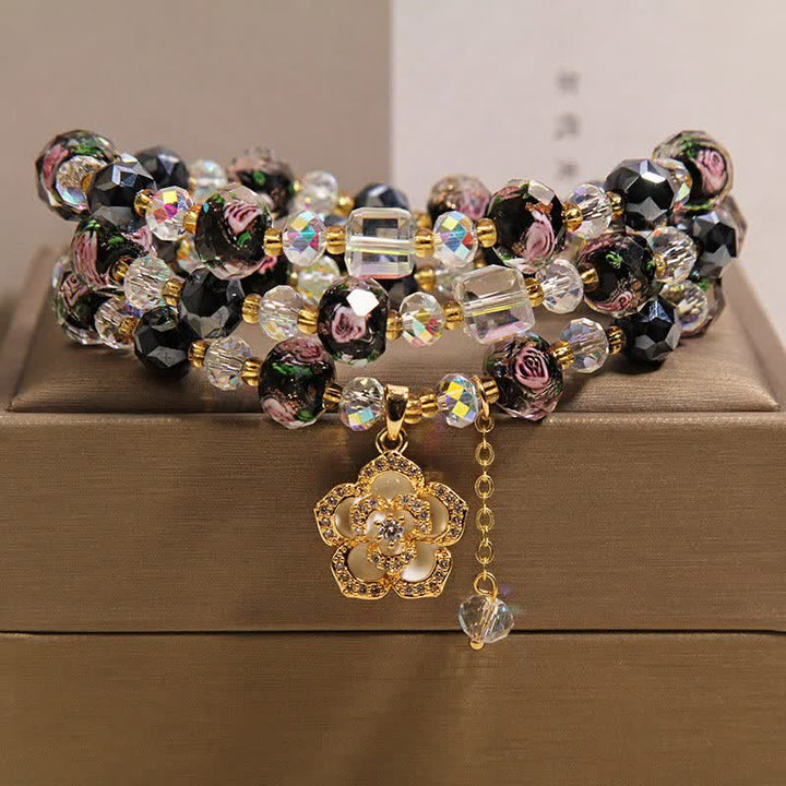 Buddha Stones Bracciale con ciondolo a forma di fiore di camelia e perline di vetro nere Liu Li, con connessione armonica. - Ciondolo Camelia Nera - image 0