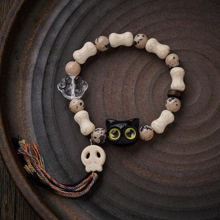 Buddha Stones Braccialetto del coraggio con design a teschio di gatto e ossa - image 1