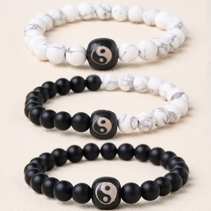 Buddha Stones Bracciale rotondo con perline in onice nera, turchese bianco e simbolo Yin Yang, equilibrio Yin Yang. - image 0