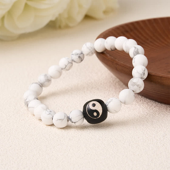 Buddha Stones Bracciale rotondo con perline in onice nera, turchese bianco e simbolo Yin Yang, equilibrio Yin Yang. - image 2