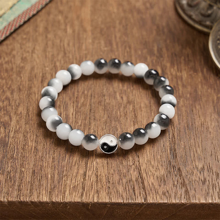 Buddha Stones Bracciale bicolore Yin Yang con perline piatte in lega e vetro. - image 3