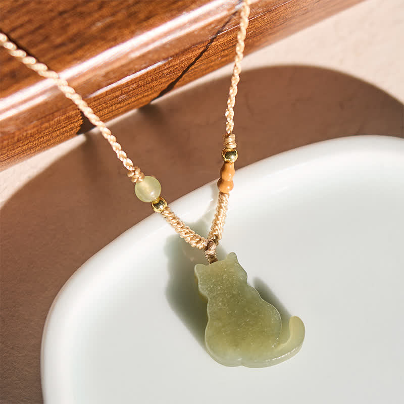 Buddha Stones Collana con ciondolo a forma di gatto in giada e cordino intrecciato, ideale per un'abbondanza di gioielli. - image 1