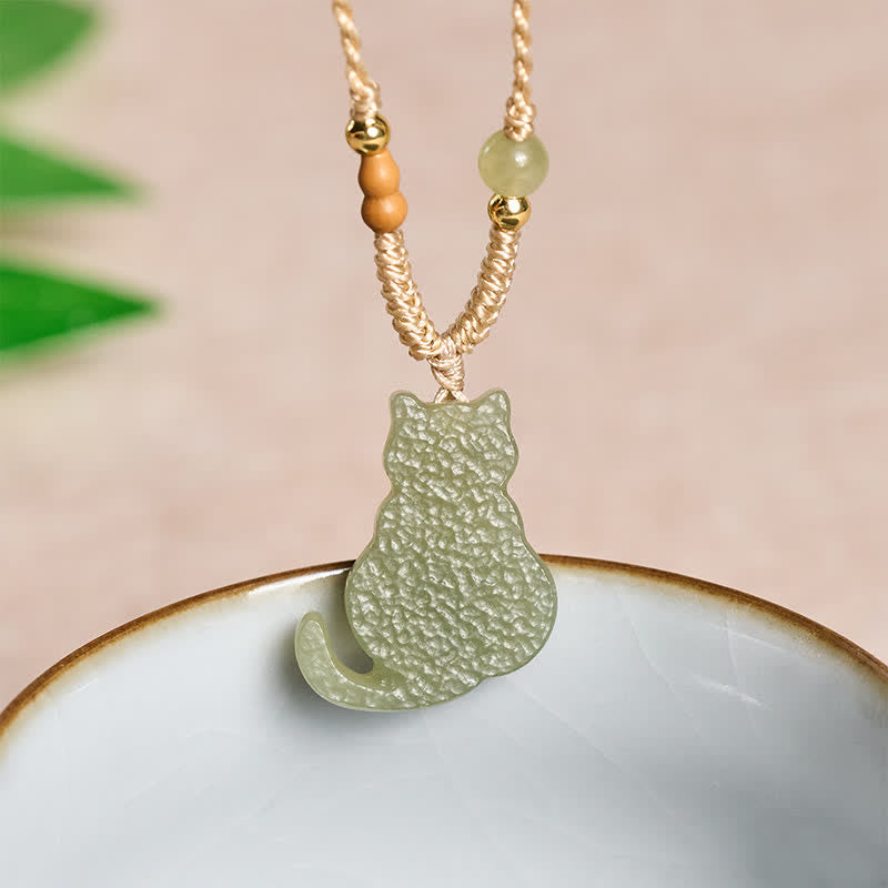 Buddha Stones Collana con ciondolo a forma di gatto in giada e cordino intrecciato, ideale per un'abbondanza di gioielli. - Giada naturale (il colore può variare) - image 0