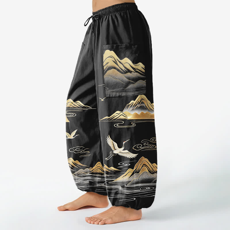 Buddha Stones Pantaloni harem da donna in cotone con elastico in vita e motivo a gru, con stampa paesaggistica serena, e tasche laterali. - image 1