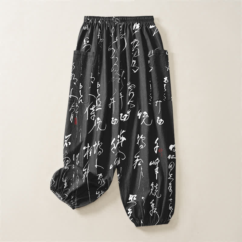 Buddha Stones Pantaloni harem da donna in cotone con motivo calligrafico zen, elastico in vita e tasche laterali. - image 4