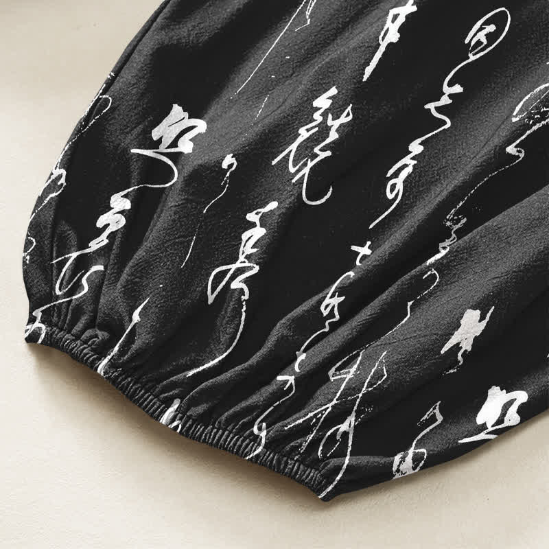 Buddha Stones Pantaloni harem da donna in cotone con motivo calligrafico zen, elastico in vita e tasche laterali. - image 6