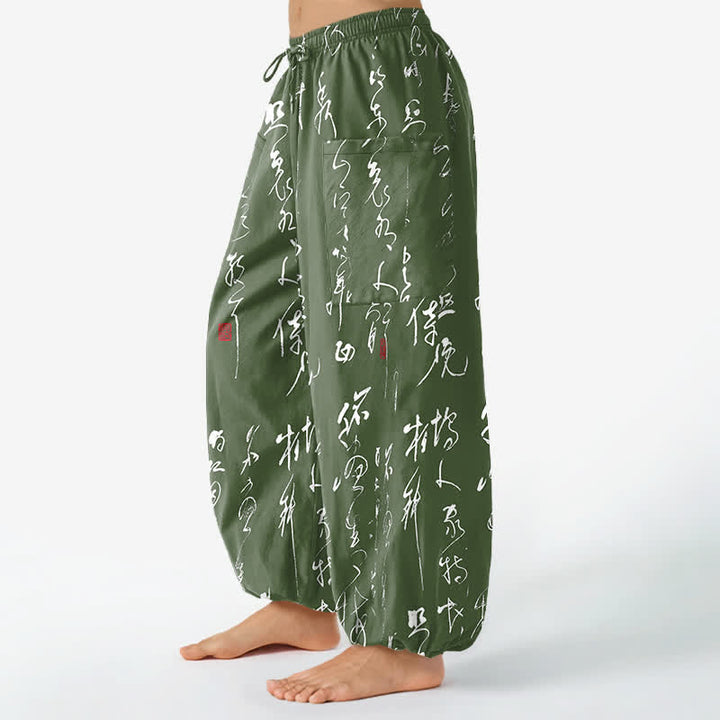 Buddha Stones Pantaloni harem da donna in cotone con motivo calligrafico zen, elastico in vita e tasche laterali. - image 8