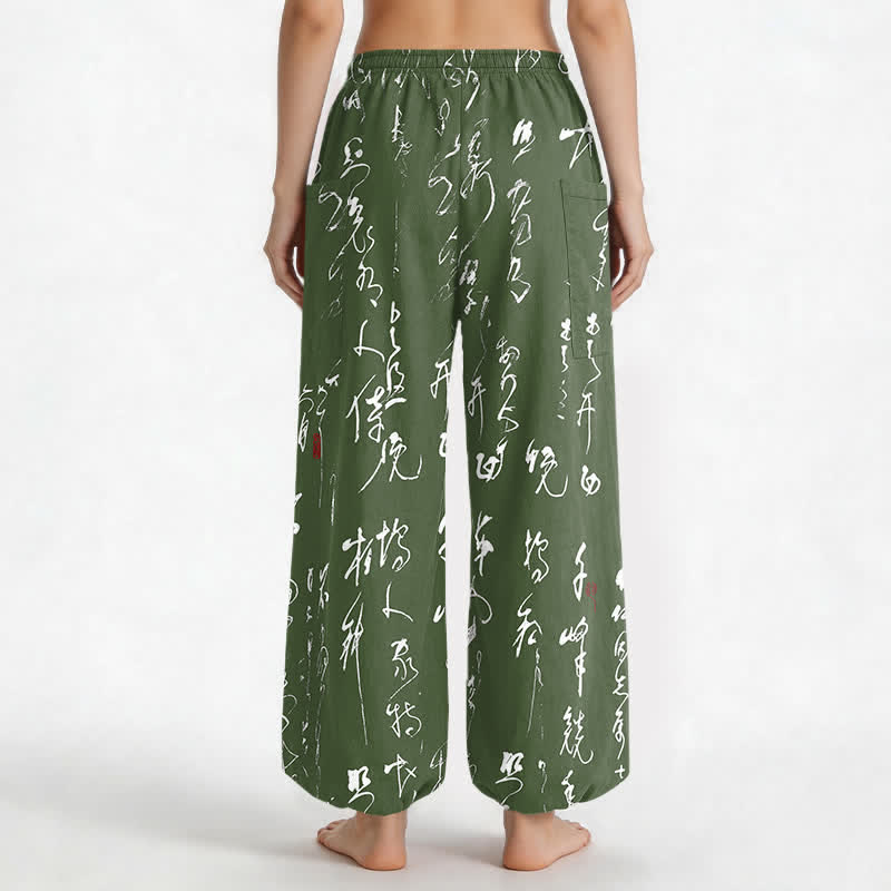 Buddha Stones Pantaloni harem da donna in cotone con motivo calligrafico zen, elastico in vita e tasche laterali. - image 9