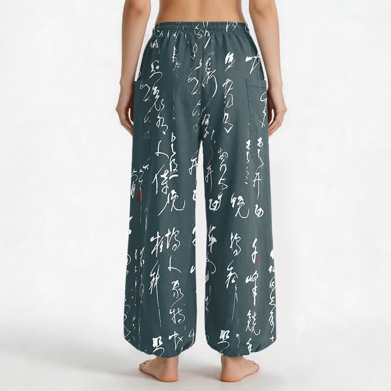 Buddha Stones Pantaloni harem da donna in cotone con motivo calligrafico zen, elastico in vita e tasche laterali. - image 12