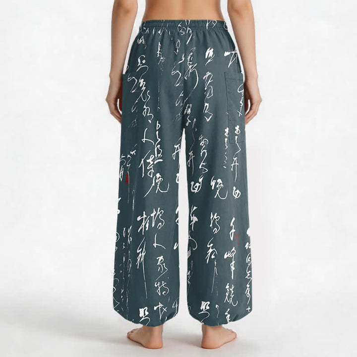 Buddha Stones Pantaloni harem da donna in cotone con motivo calligrafico zen, elastico in vita e tasche laterali. - image 12