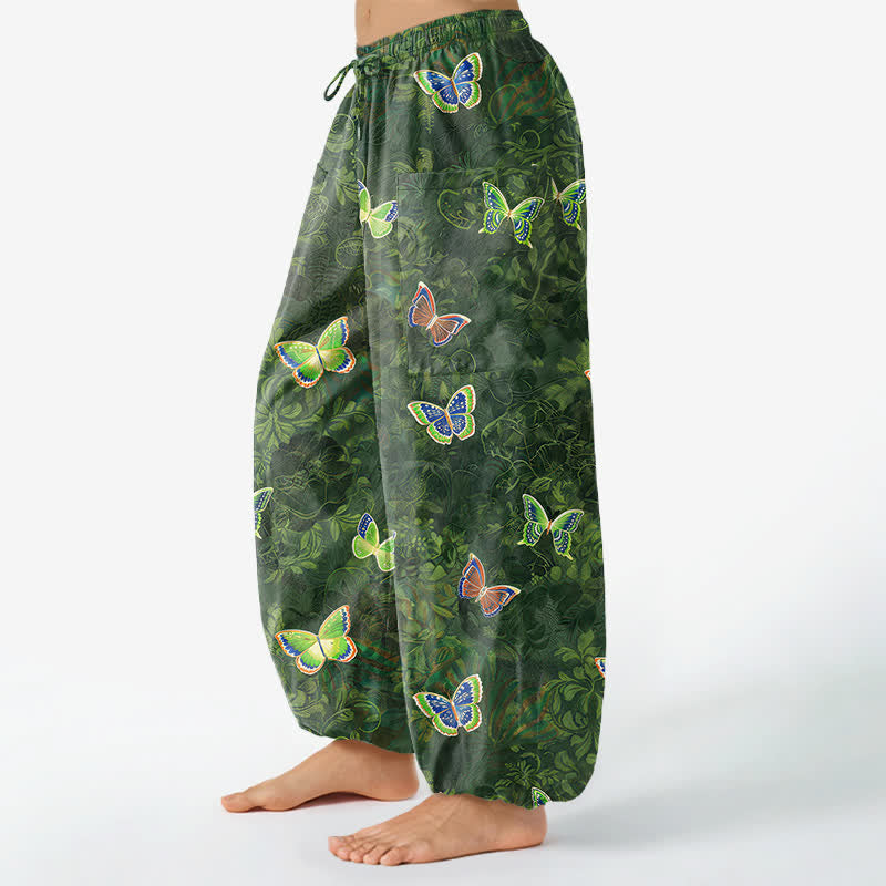 Buddha Stones Pantaloni harem da donna in cotone con elastico in vita e tasche laterali, ispirati alla natura, con motivo a farfalle e foglie. - image 1