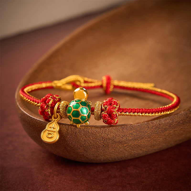 Buddha Stones Braccialetto portafortuna con tartaruga verde, zucca di rame e cordino rosso - image 1
