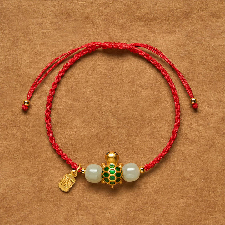Buddha Stones Braccialetto portafortuna con scritta "Tartaruga di rame Fu" e filo rosso di giada Hetian, simbolo di prosperità. - Braccialetto con cordino rosso tartaruga - 5,5–7,1 pollici/14–18 cm - image 0