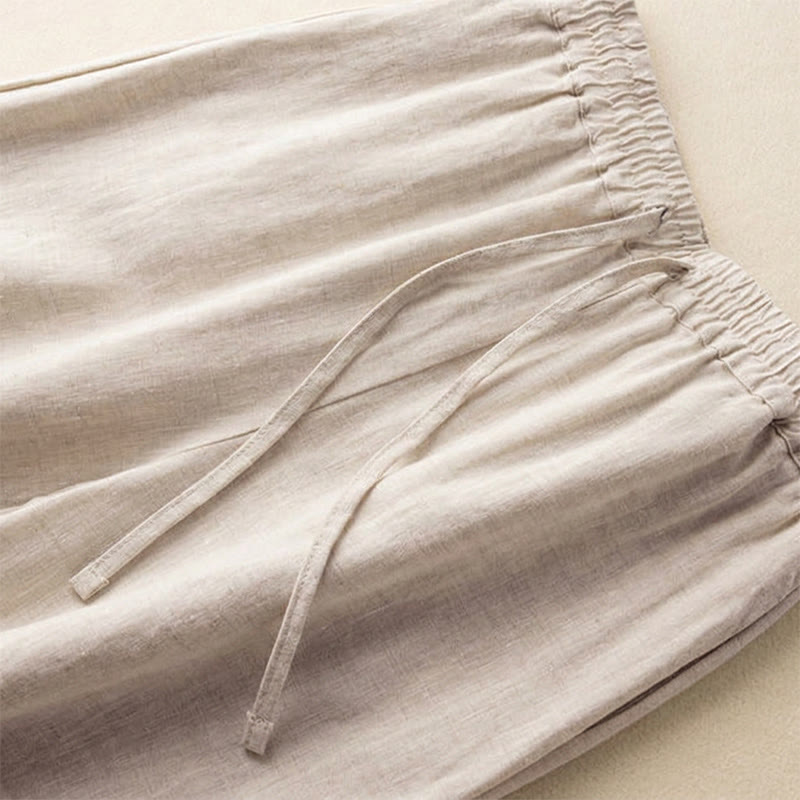 Pantaloni da donna a gamba larga con coulisse e tasche, con ricamo a motivo bohémien Buddha Stones. - image 1
