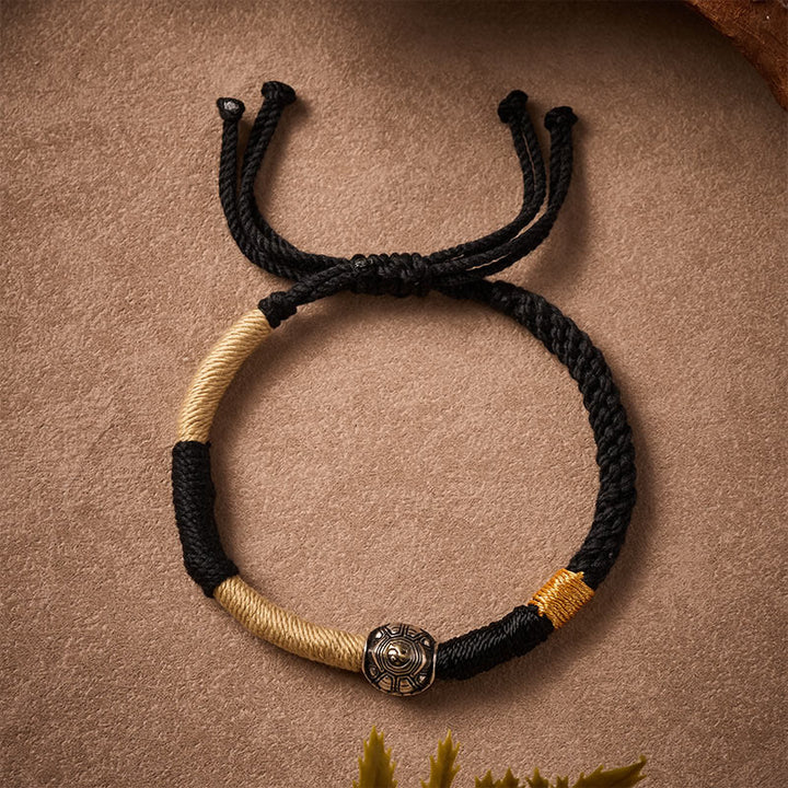 Buddha Stones Braccialetto della saggezza intrecciato a mano con tartaruga Yinyang in ottone e cordino nero. - image 1